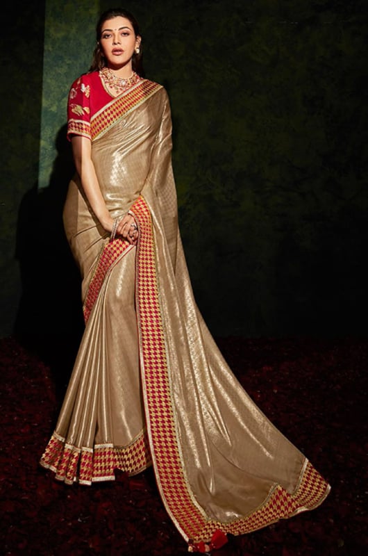 Kajal Aggarwal Beige Shimmer Georgette Designer Saree for Ceremonial