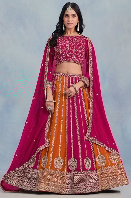 Magenta and Tangerine Embroidered Faux Georgette Lehenga Choli