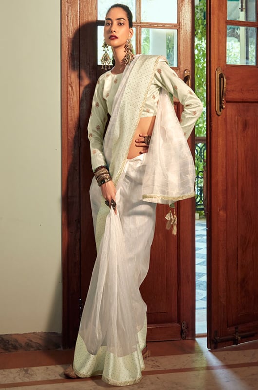 Off White Organza Saree with Raw Silk Blouse