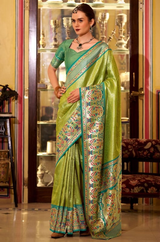 Parrot Green Soft Tissue Silk Zari Woven Saree