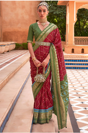 Berry Red Patola Silk Saree with Embellished Blouse