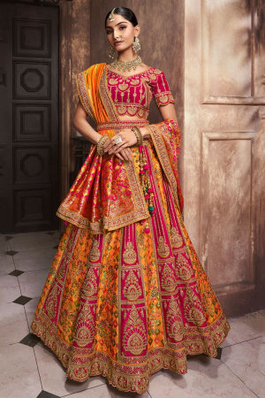 Golden Yellow and Rani Pink Embroidered Banarasi Silk Designer Bridal Lehenga Set
