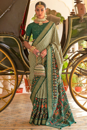 Off White and Pine Green Embellished Silk Saree