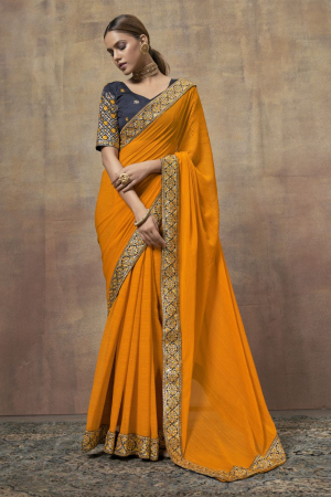 Turmeric Yellow Chiffon Saree with Embroidered Blouse
