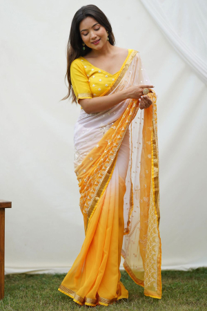 White and Mango Yellow Embroidered Georgette Saree