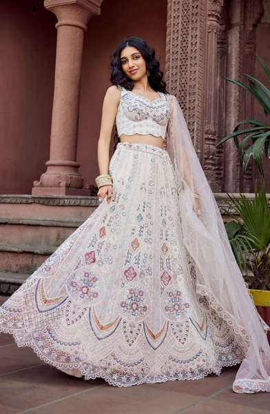 Cream Net Heavy Embroidered Lehenga Choli for Wedding