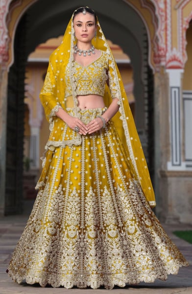 Mustard Embroidered Net Bridal Lehenga Choli