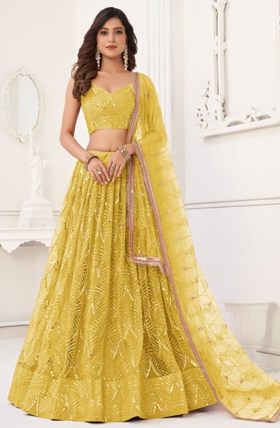 Maize Yellow Embroidered Net Lehenga Choli