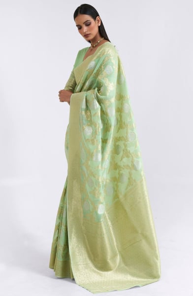 Pastel Green Linen Saree with Zari Weaving