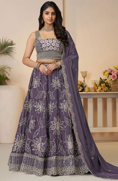 Purple Net Heavy Sequins Embroidered Lehenga Choli Set