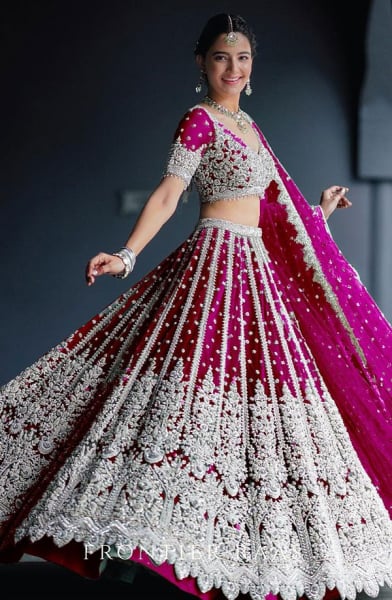 Rani Pink Embroidered Net Designer Lehenga Choli