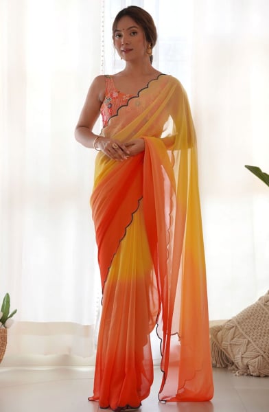 Sunny Yellow and Orange Faux Georgette Saree with Embroidered Blouse