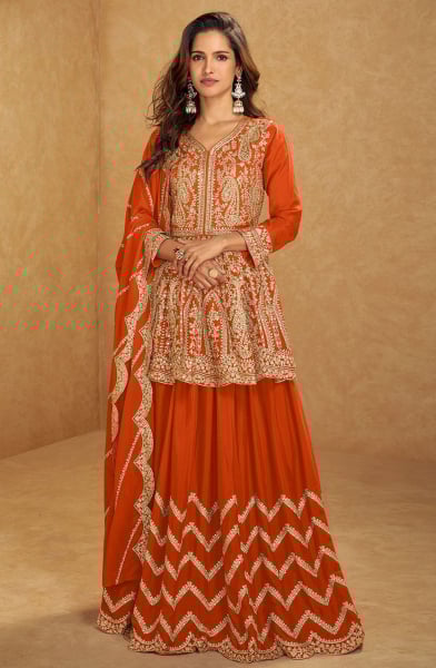 Tangy Orange Embroidered Chinnon Silk Lehenga Kameez