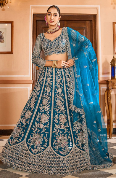 Teal Blue Net Heavy Embroidered Lehenga Choli for Wedding
