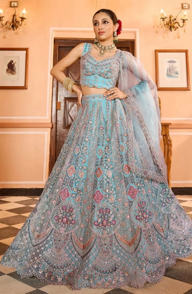 Turquoise Net Heavy Embroidered Lehenga Choli for Wedding